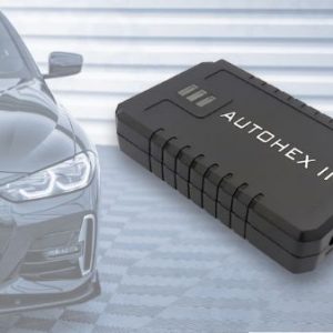 a black electronic device next to a black car
