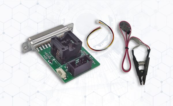 a green circuit board with black connectors and wires